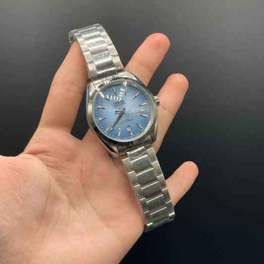 OM Silver Chain With Sky Blue Dial Automatic Watch