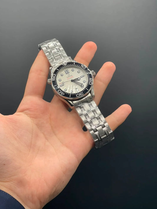 OM Silver Chain With White Dial And Black Bezel Automatic Watch