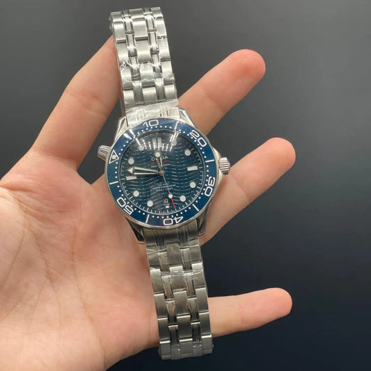 OM Silver Chain With Blue Dial And Blue Rotatable Bezel Automatic Watch