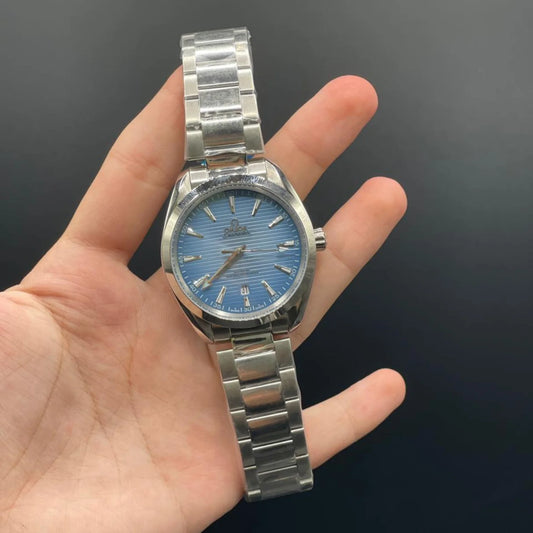 OM Silver Chain With Sky Blue Dial Automatic Watch