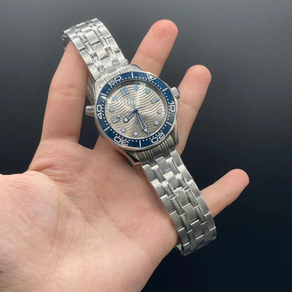 OM Silver Chain With Gray Dial And Blue Rotatable Bezel Automatic Watch