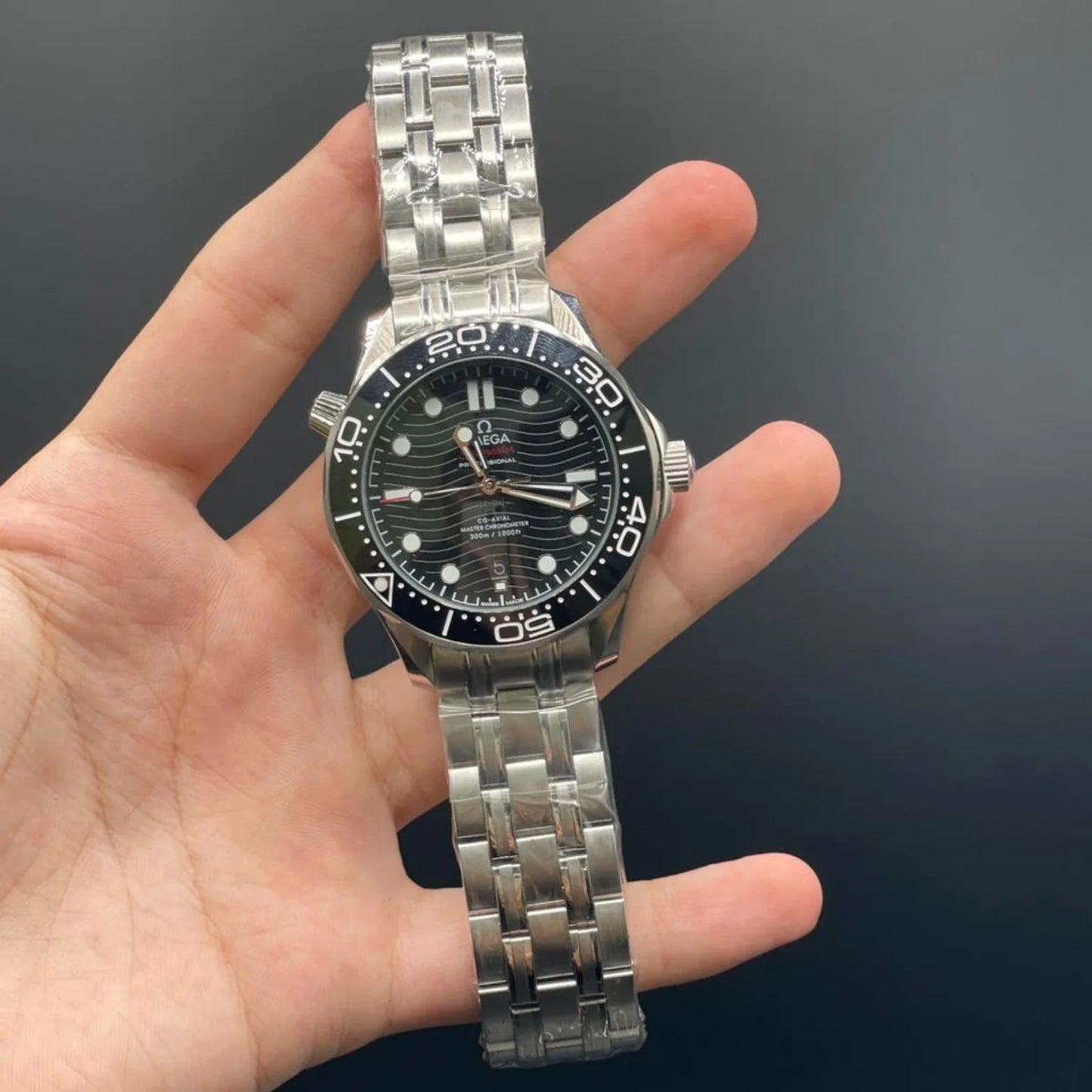 OM Silver Chain With Black Dial And Black Rotatable Bezel Automatic Watch