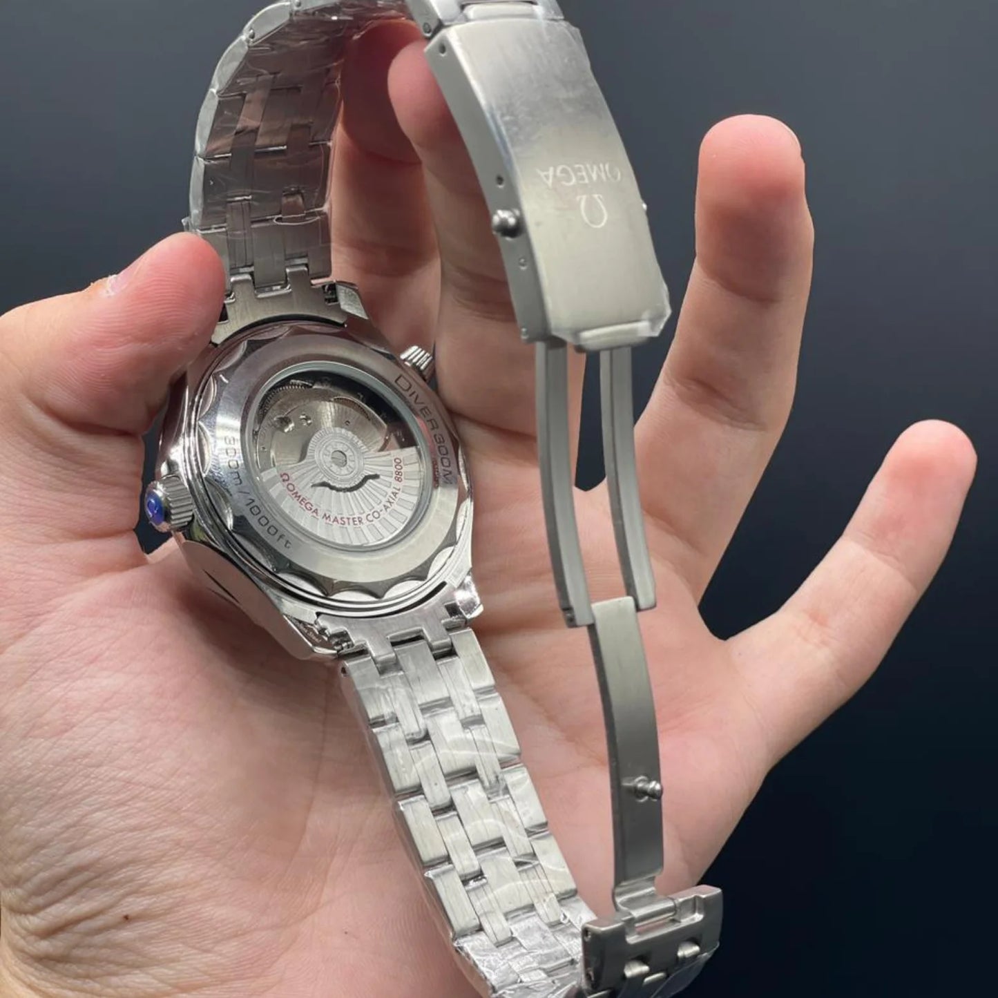 OM Silver Chain With Black Dial And Black Rotatable Bezel Automatic Watch