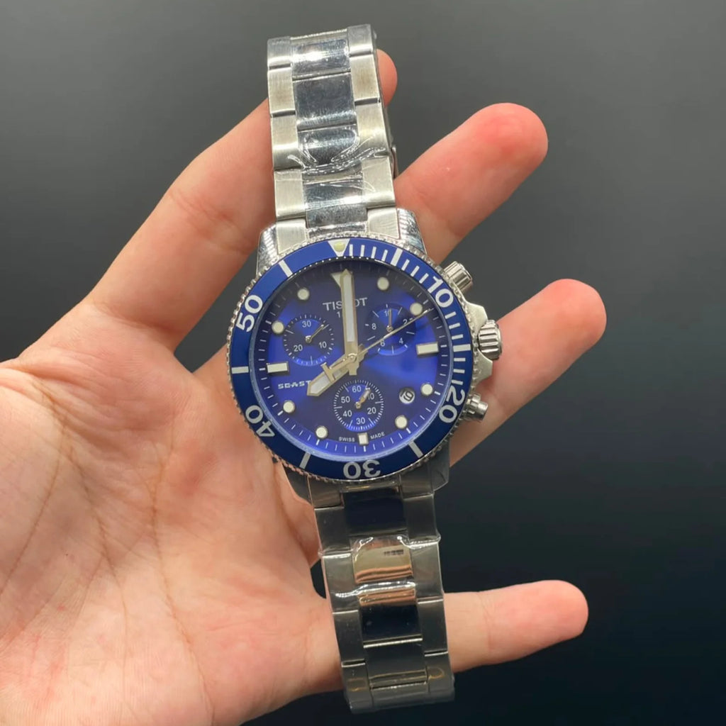 TT Silver Chain With Blue Chronograph Dial With Blue Rotatable Bezel Automatic Watch