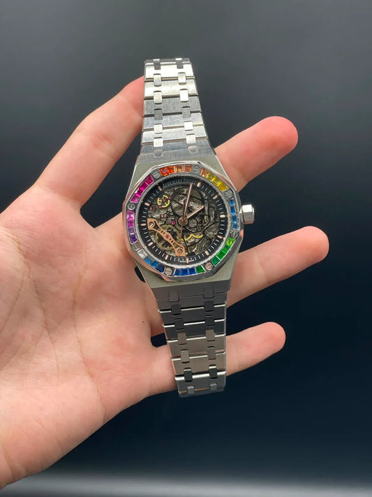 AP Silver Chain With Black Skeleton Dial And Rainbow Bezel Automatic Watch