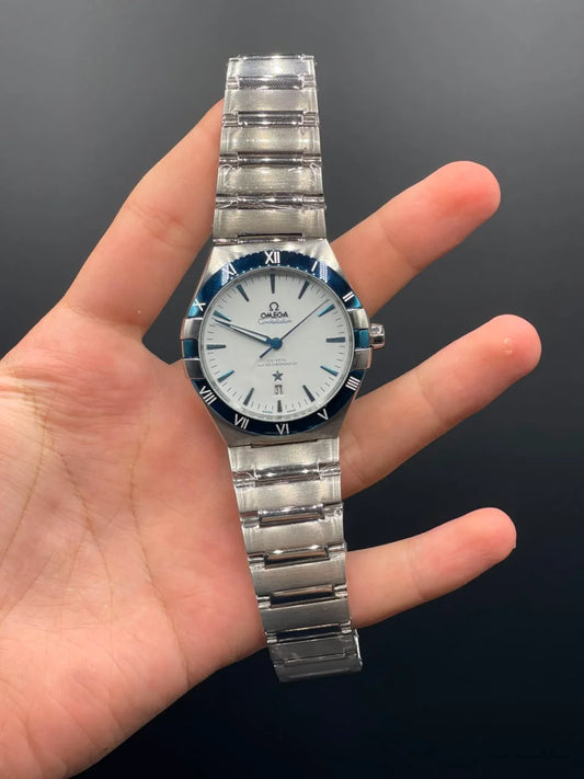 OM Silver Chain With White Dial And Blue Bezel Automatic Watch