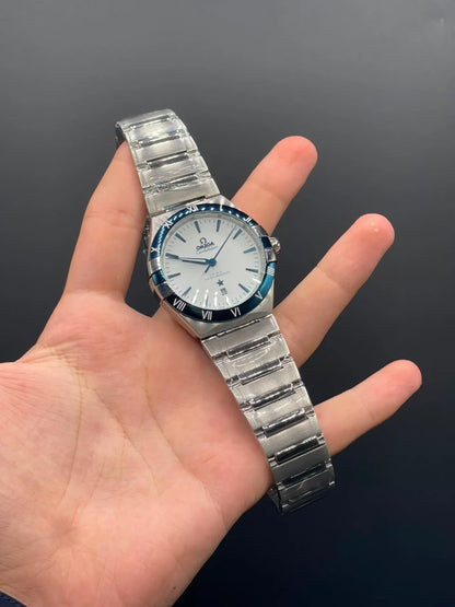 OM Silver Chain With White Dial And Blue Bezel Automatic Watch