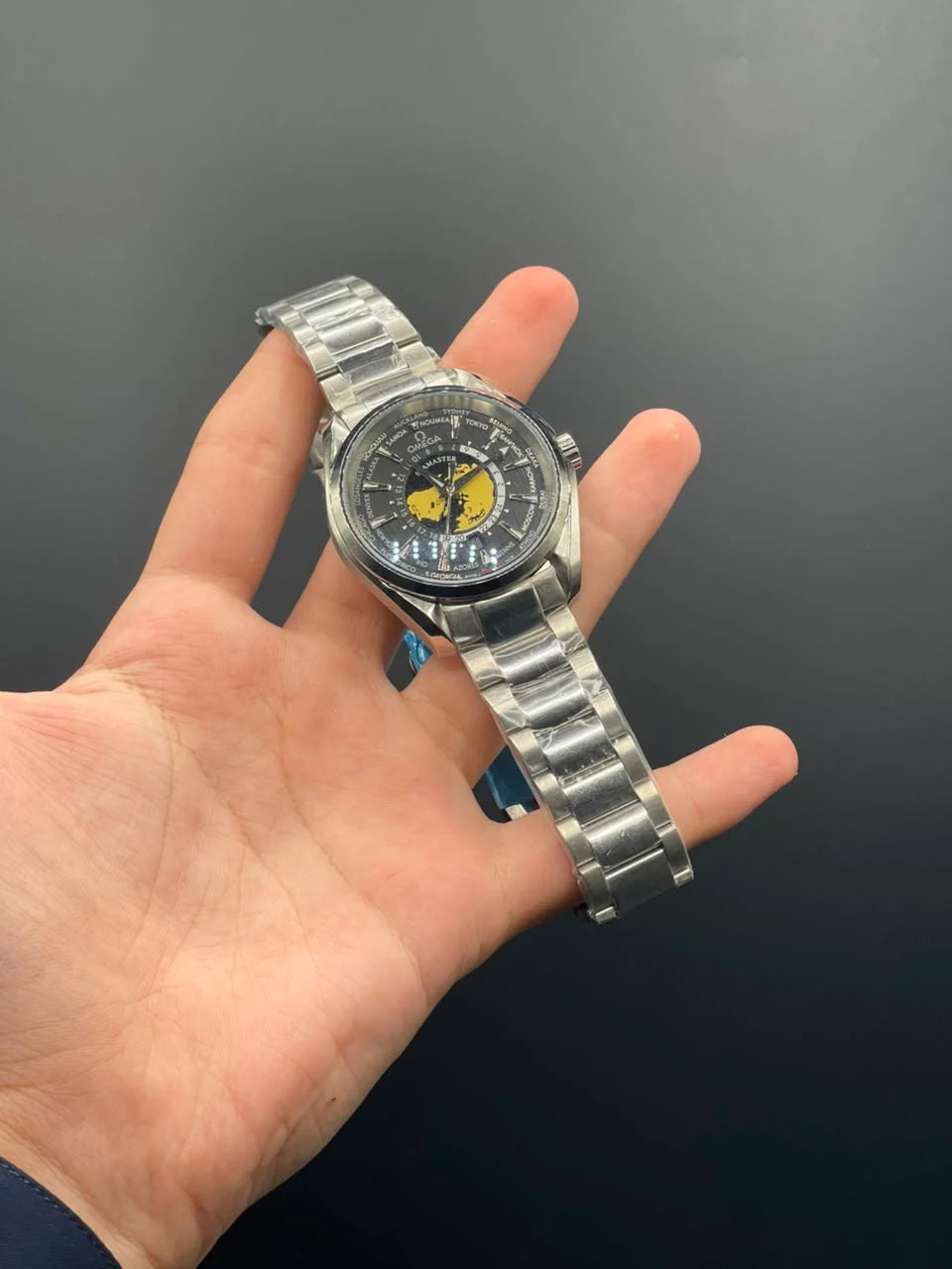 OM Silver Chain With Black Planet Dial Automatic Watch