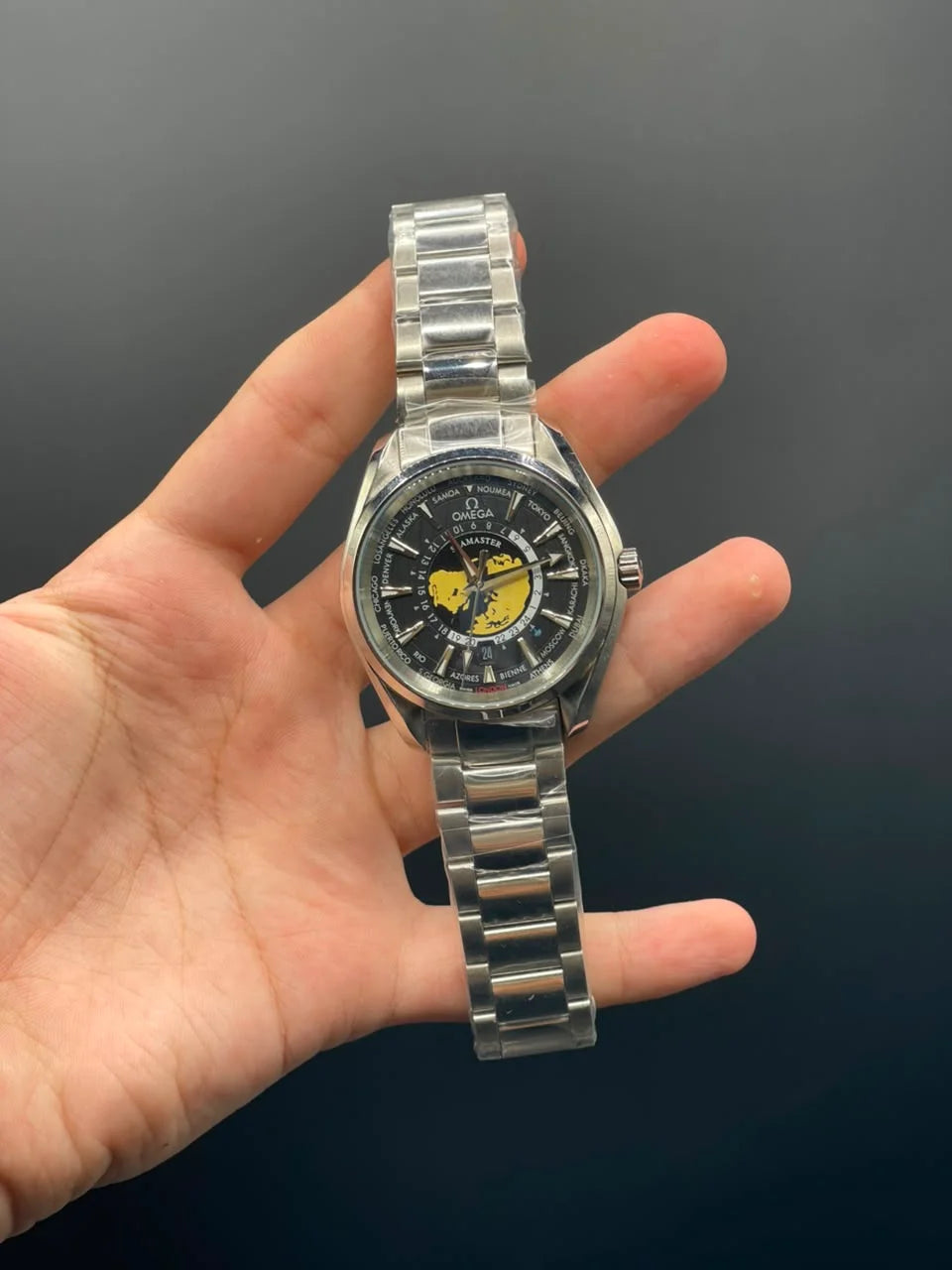 OM Silver Chain With Black Planet Dial Automatic Watch