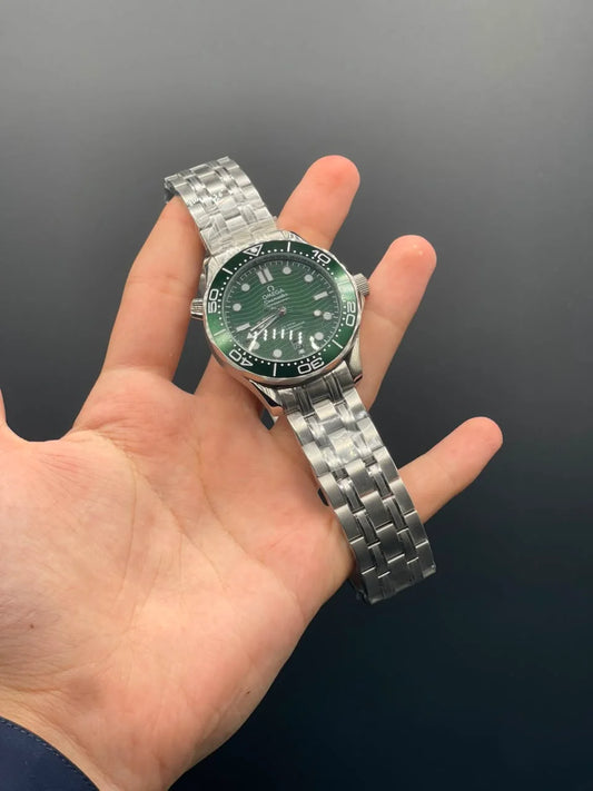 OM Silver Chain With Green Dial And Rotatable Bezel Automatic Watch